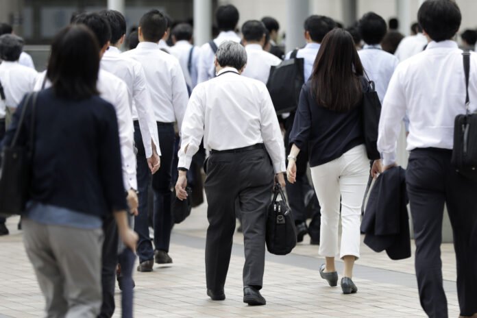 Commuters As Japan痴 Wages Fall Again, Adding to Concerns Over Tax Hike